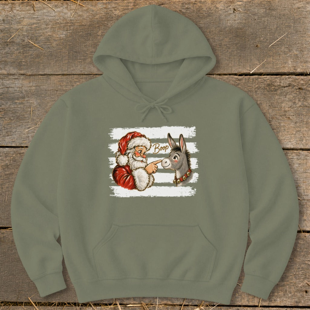 Santa booping a donkey with the word "Boop" on a striped background.