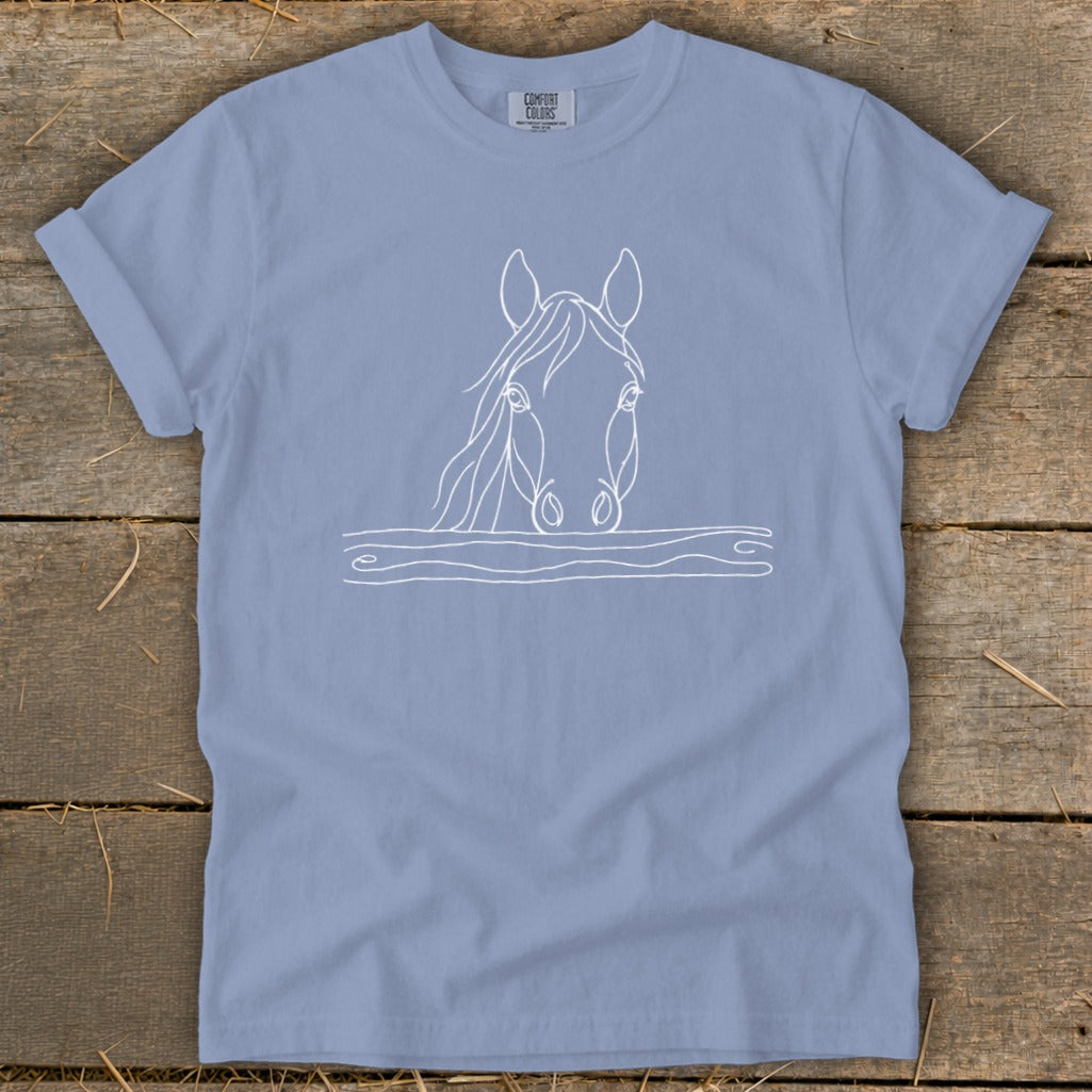 Light blue t-shirt with a white outline drawing of a horse's head.