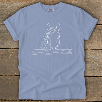 Light blue t-shirt with a white outline drawing of a horse's head.