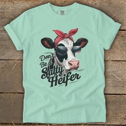 Cow wearing bandana and sunglasses with text "Don't Be a Salty Heifer".