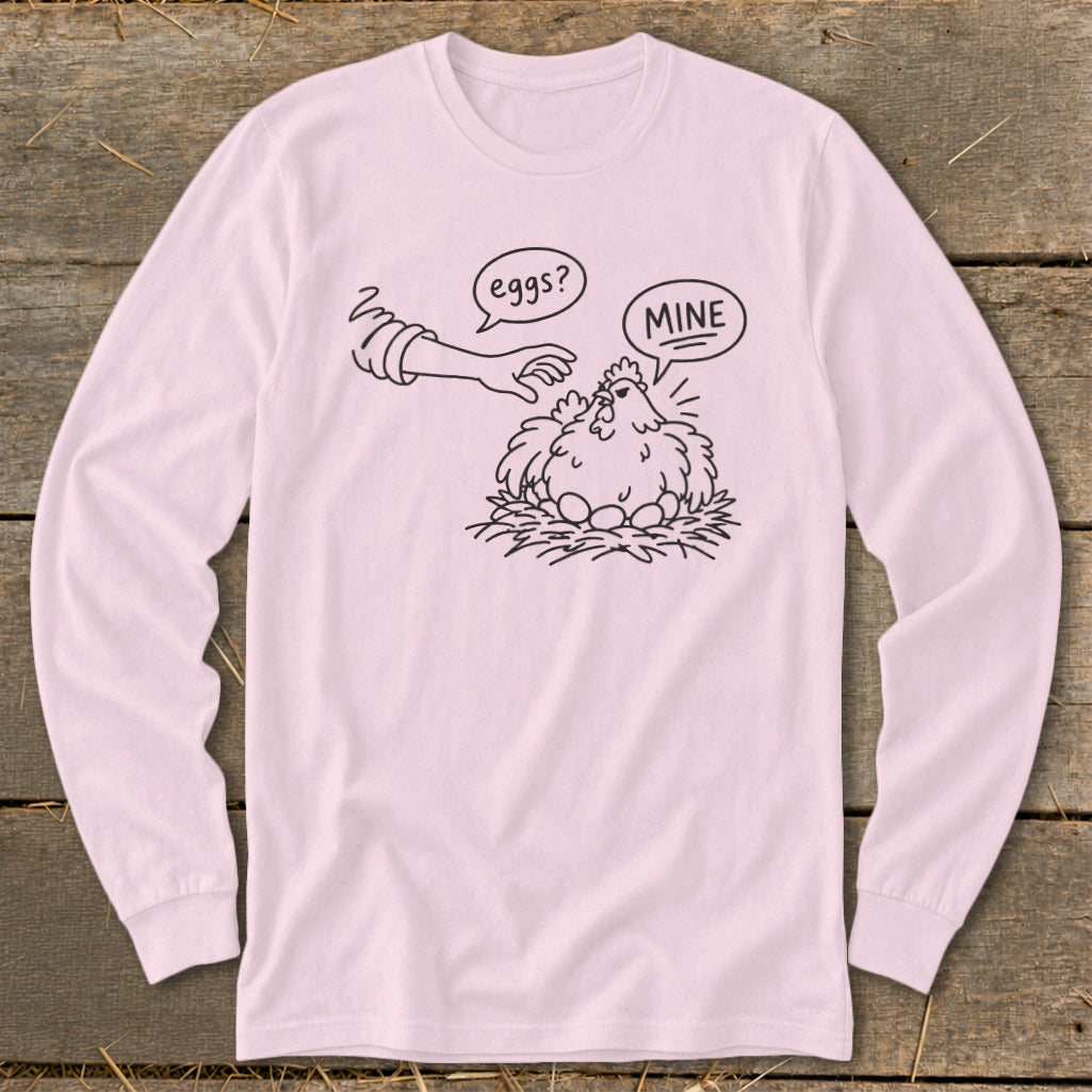 Cartoon hen on nest with eggs, hand asks "eggs?", hen replies "MINE".