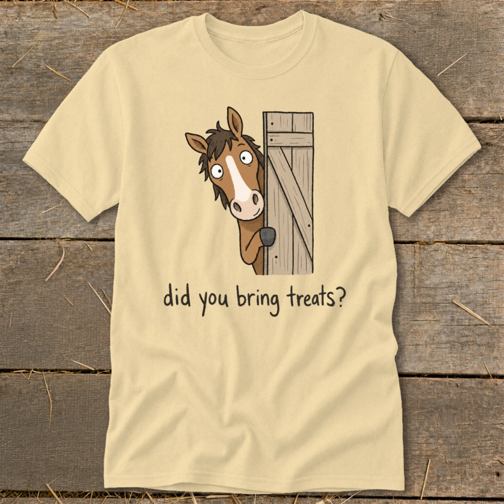 Light yellow t-shirt with cartoon horse peeking from a wooden door and text "did you bring treats?".