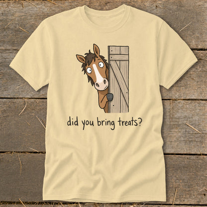 Light yellow t-shirt with cartoon horse peeking from a wooden door and text "did you bring treats?".