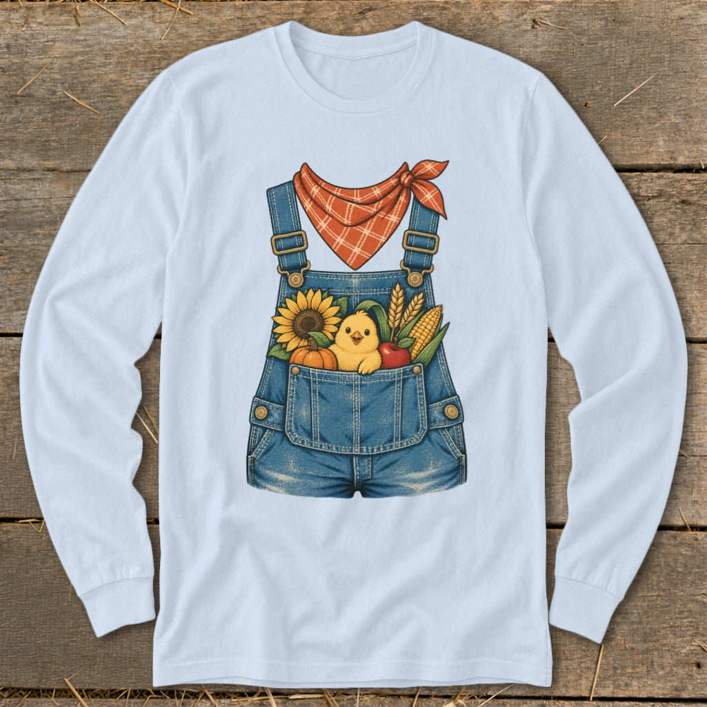 Blue overalls with a sunflower, chick, corn, pumpkin, and apple in the pocket.