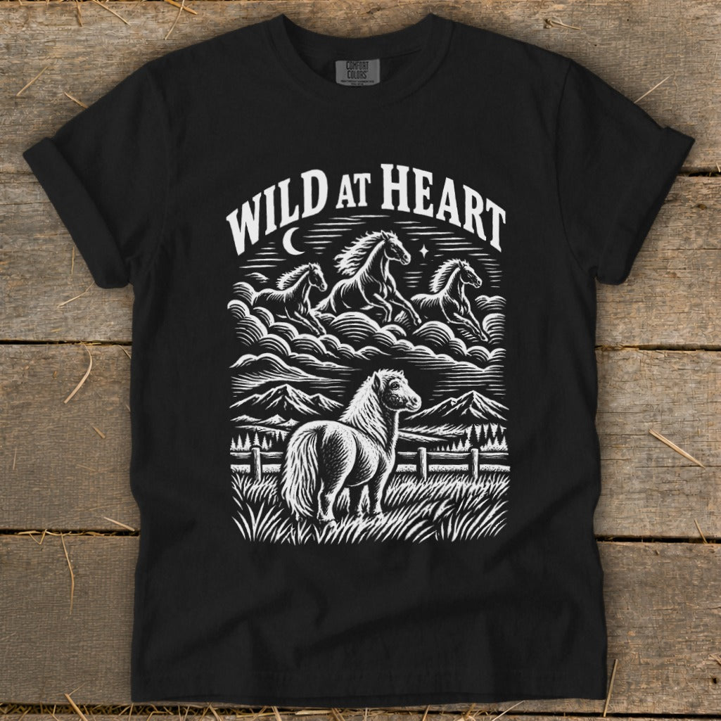 Black t-shirt with white "Wild At Heart" text and horse illustrations.