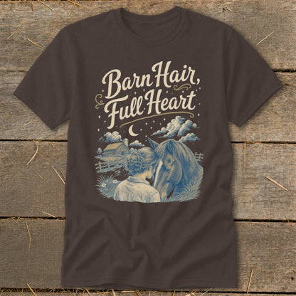 T-shirt graphic with text "Barn Hair, Full Heart" and illustration of a woman and horse.