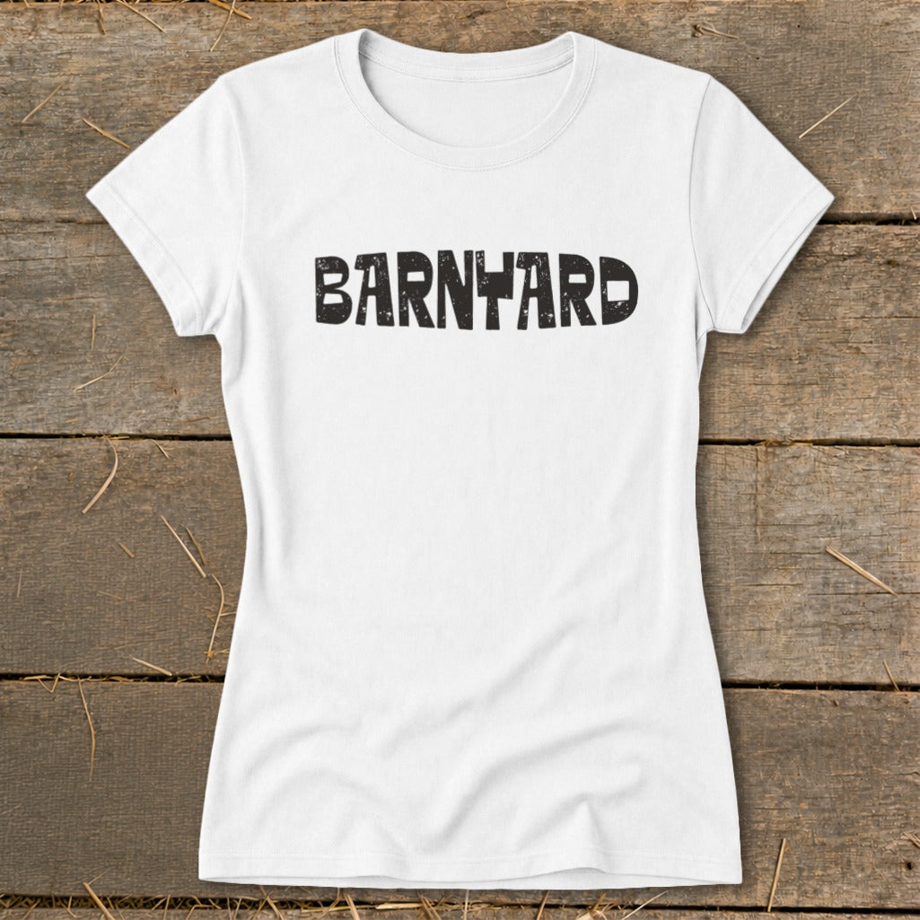 A white short-sleeved t-shirt with the word BARNYARD printed in distressed black lettering across the chest.