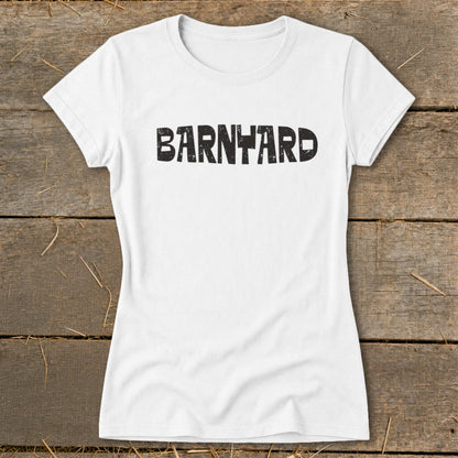 A white short-sleeved t-shirt with the word BARNYARD printed in distressed black lettering across the chest.