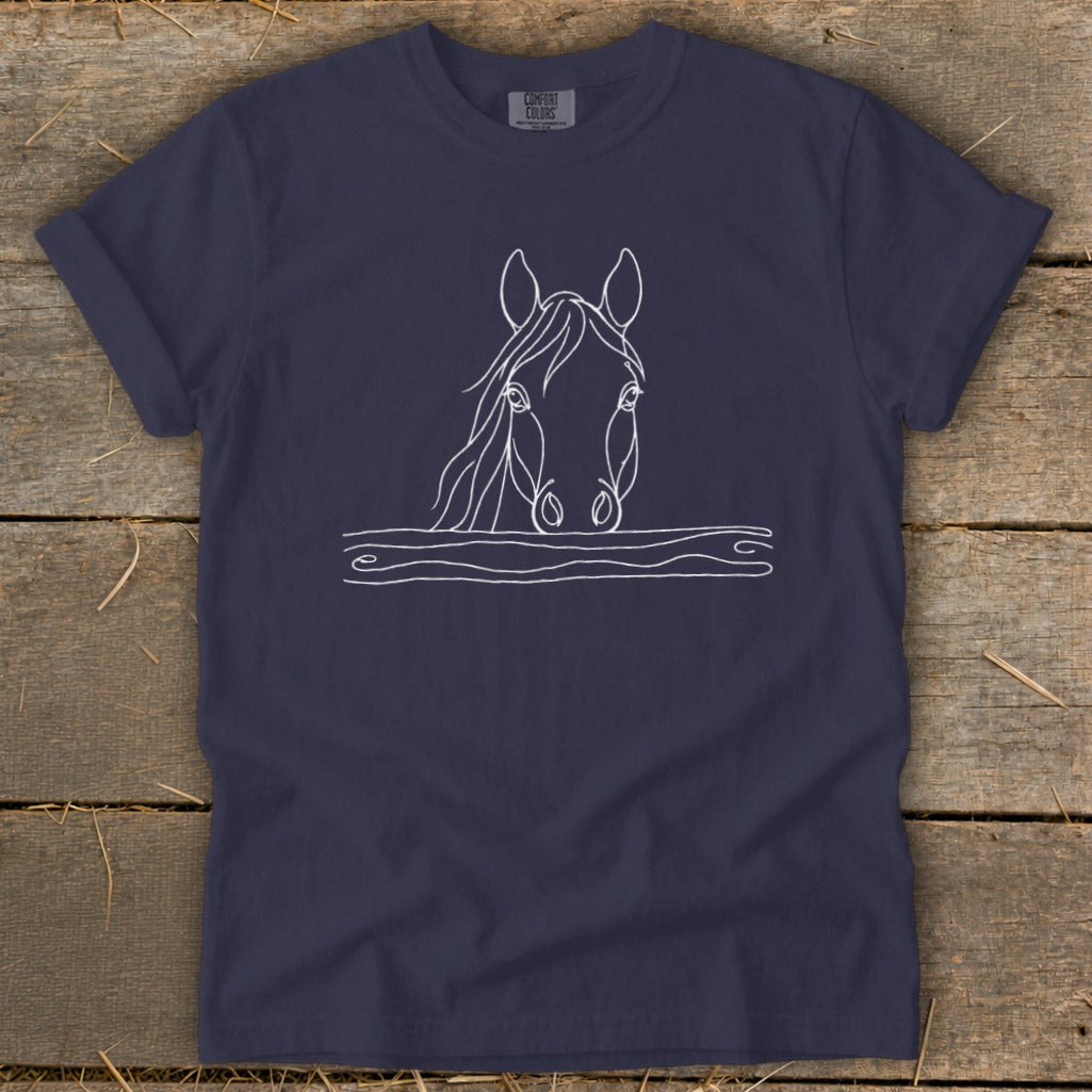 Navy t-shirt with white line drawing of horse head over wooden planks.