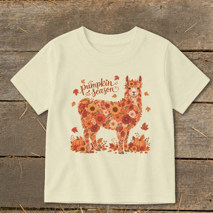 Cream t-shirt with floral alpaca and "pumpkin season" text.
