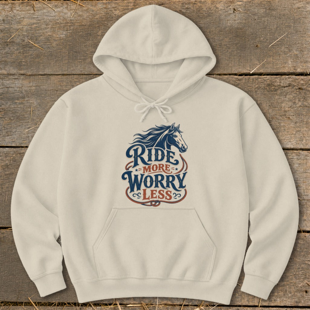 Cream hoodie with "Ride More Worry Less" text and a horse graphic.