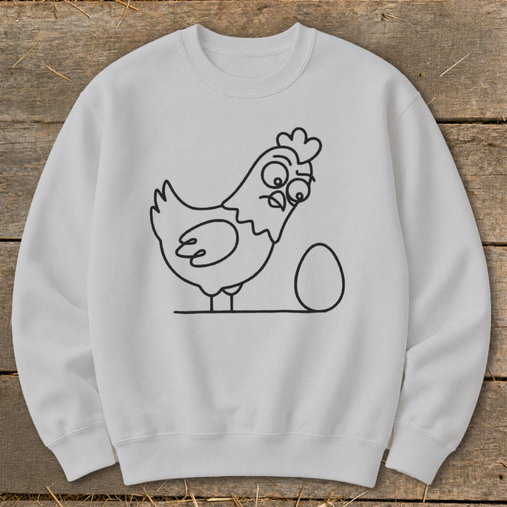 White sweatshirt with a black outline drawing of a surprised chicken next to an egg.