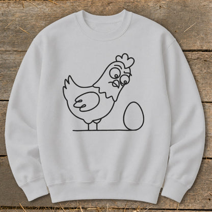 White sweatshirt with a black outline drawing of a surprised chicken next to an egg.