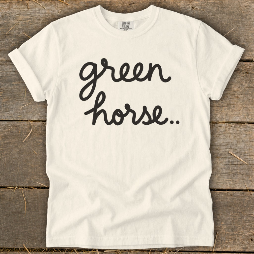 Cream t-shirt with black cursive text reading "green horse.."