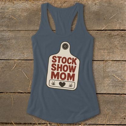 Blue tank top with "Stock Show Mom" text and heart graphic on a tag.
