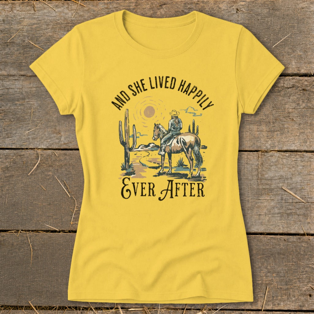 Yellow t-shirt with Western graphic: "And She Lived Happily Ever After"