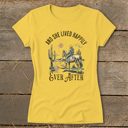 Yellow t-shirt with Western graphic: "And She Lived Happily Ever After"