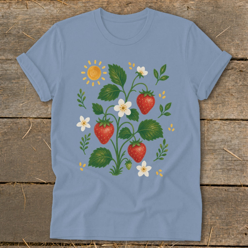 Light blue t-shirt with a watercolor illustration of a strawberry plant and a smiling sun.