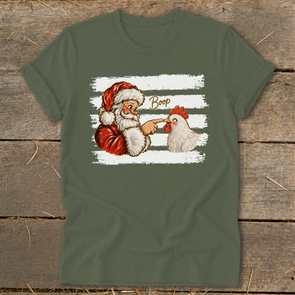 Santa booping a chicken with the word "Boop" above them on a t-shirt.