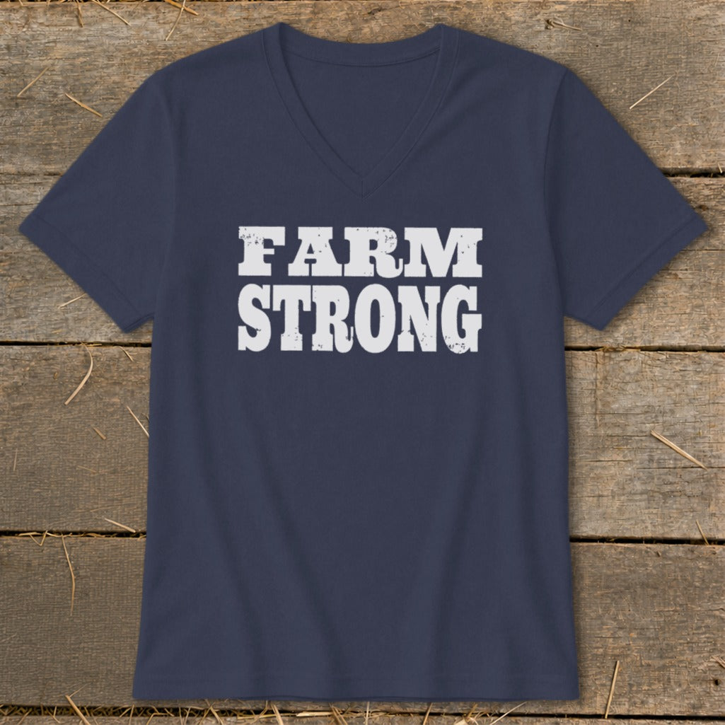 A dark blue V-neck T-shirt with the white distressed text "FARM STRONG" displayed centrally on the chest.