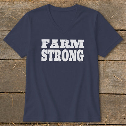 A dark blue V-neck T-shirt with the white distressed text "FARM STRONG" displayed centrally on the chest.