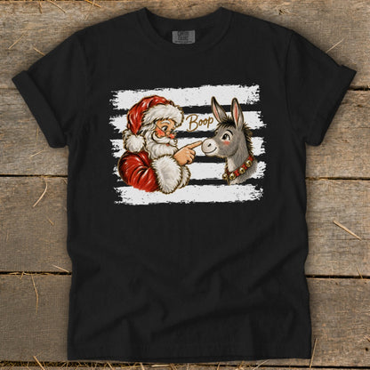 Santa pointing at a donkey with the word "Boop" on a black t-shirt.