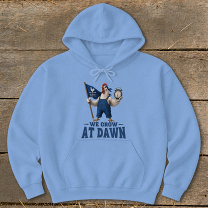 Light blue hoodie with a chicken holding a flag and alarm clock, text "WE GROW AT DAWN."