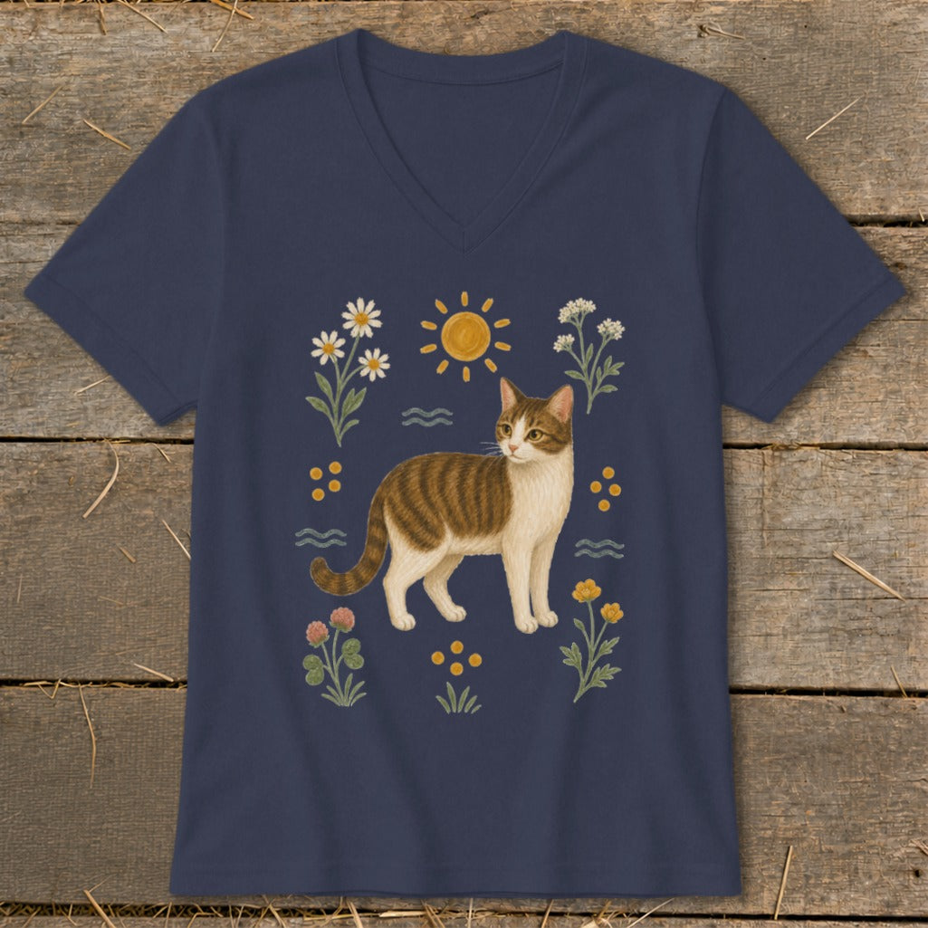 Navy v-neck t-shirt with a tabby cat surrounded by flowers and sun.