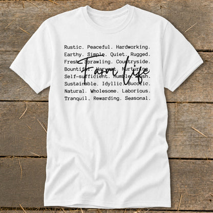 White t-shirt with "Farm life" and descriptive words in black text.