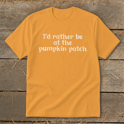 Orange t-shirt with white text that says "I'd rather be at the pumpkin patch".