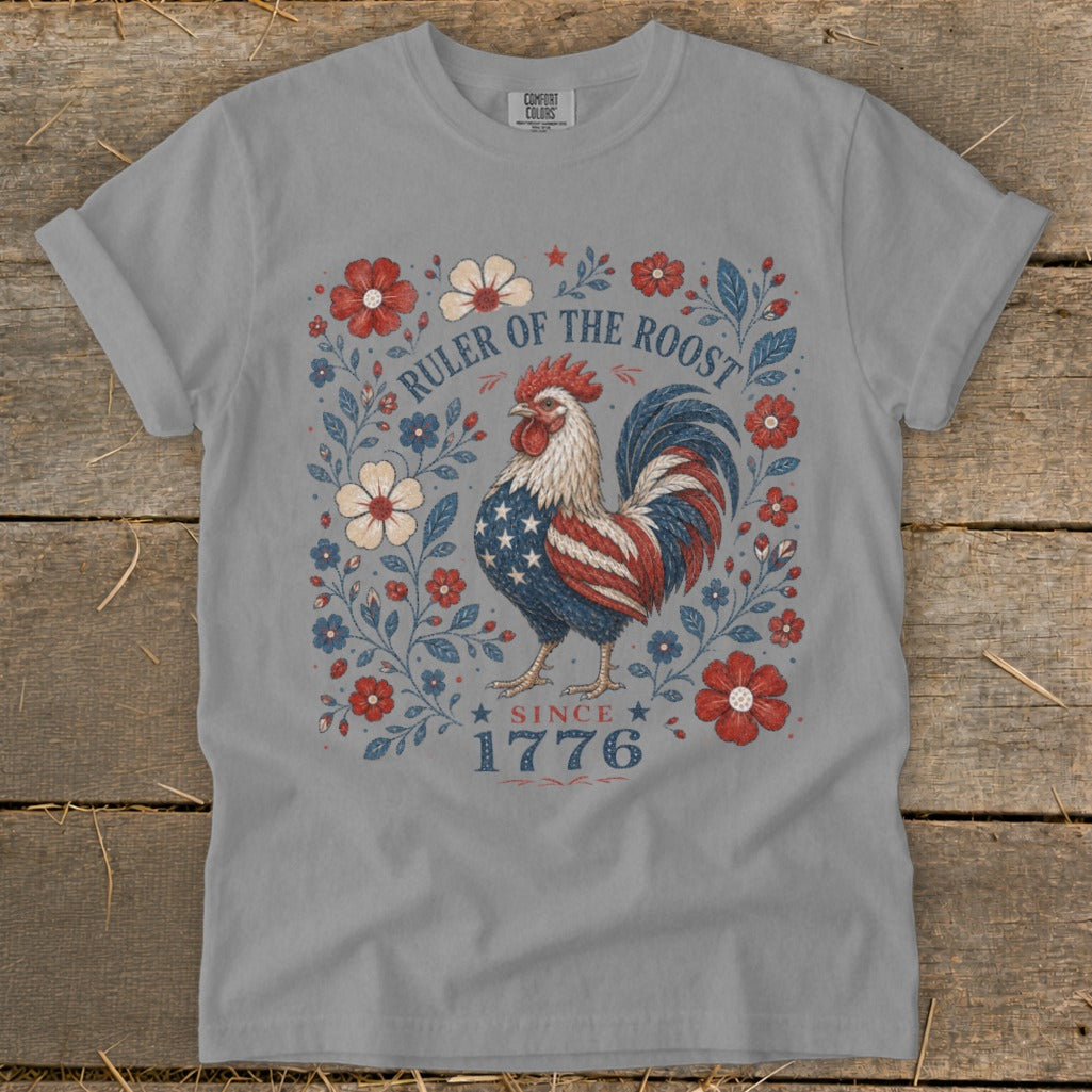 Grey t-shirt with patriotic rooster and floral design, "Ruler of the Roost Since 1776" text.