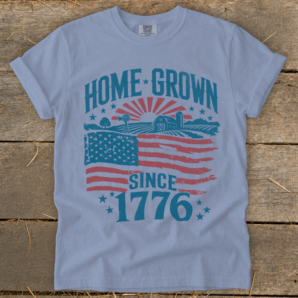 Light blue t-shirt with "HOME GROWN SINCE 1776" and American flag design.