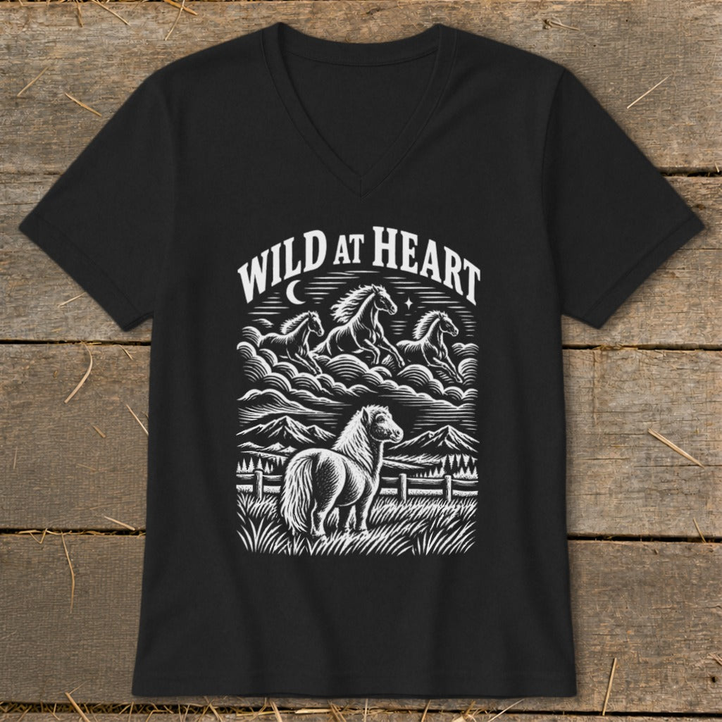 Black t-shirt with "WILD AT HEART" graphic featuring horses and mountains.