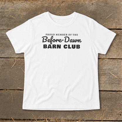 White t-shirt with black text: "Proud member of the Before-Dawn Barn Club".