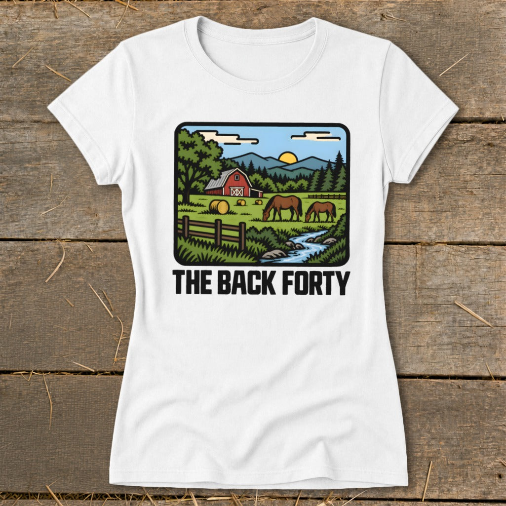 White t-shirt featuring a farm scene graphic with horses, a red barn, and the text THE BACK FORTY.