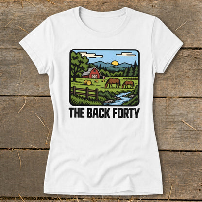 White t-shirt featuring a farm scene graphic with horses, a red barn, and the text THE BACK FORTY.