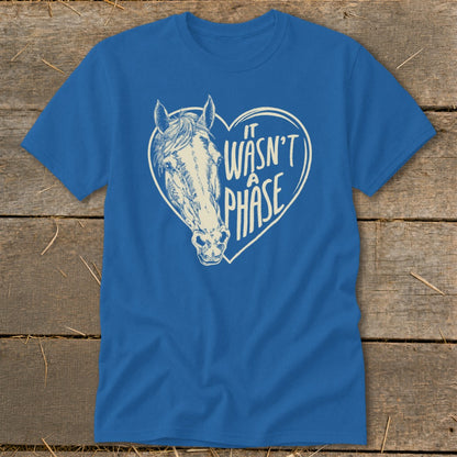 Blue t-shirt with horse head inside a heart graphic and text "It wasn't a phase".