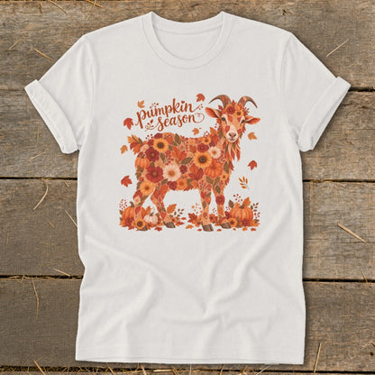 White t-shirt with a goat design made of flowers and pumpkins, saying "Pumpkin season".