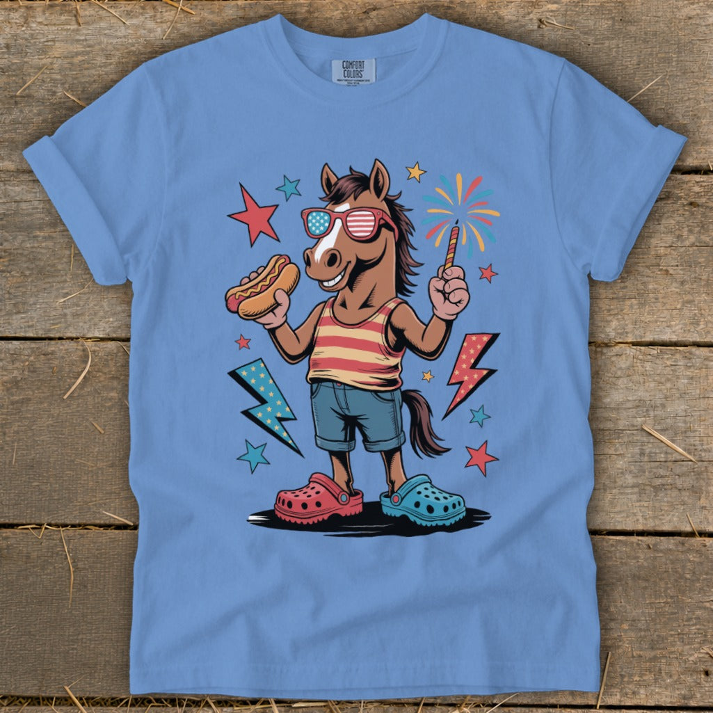 Cartoon horse in sunglasses holding a hot dog and a sparkler.