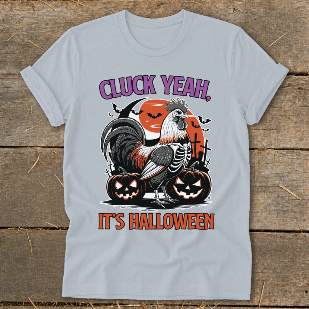 Rooster skeleton with pumpkins and bats graphic reads "Cluck Yeah, It's Halloween".