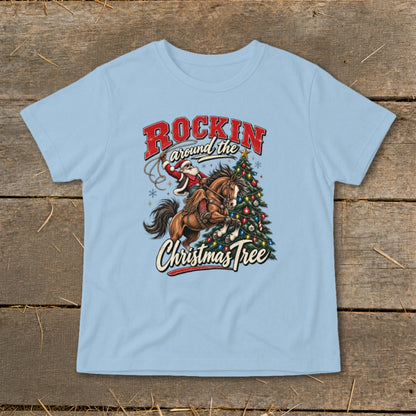 Light blue t-shirt with Santa on horseback around a Christmas tree.