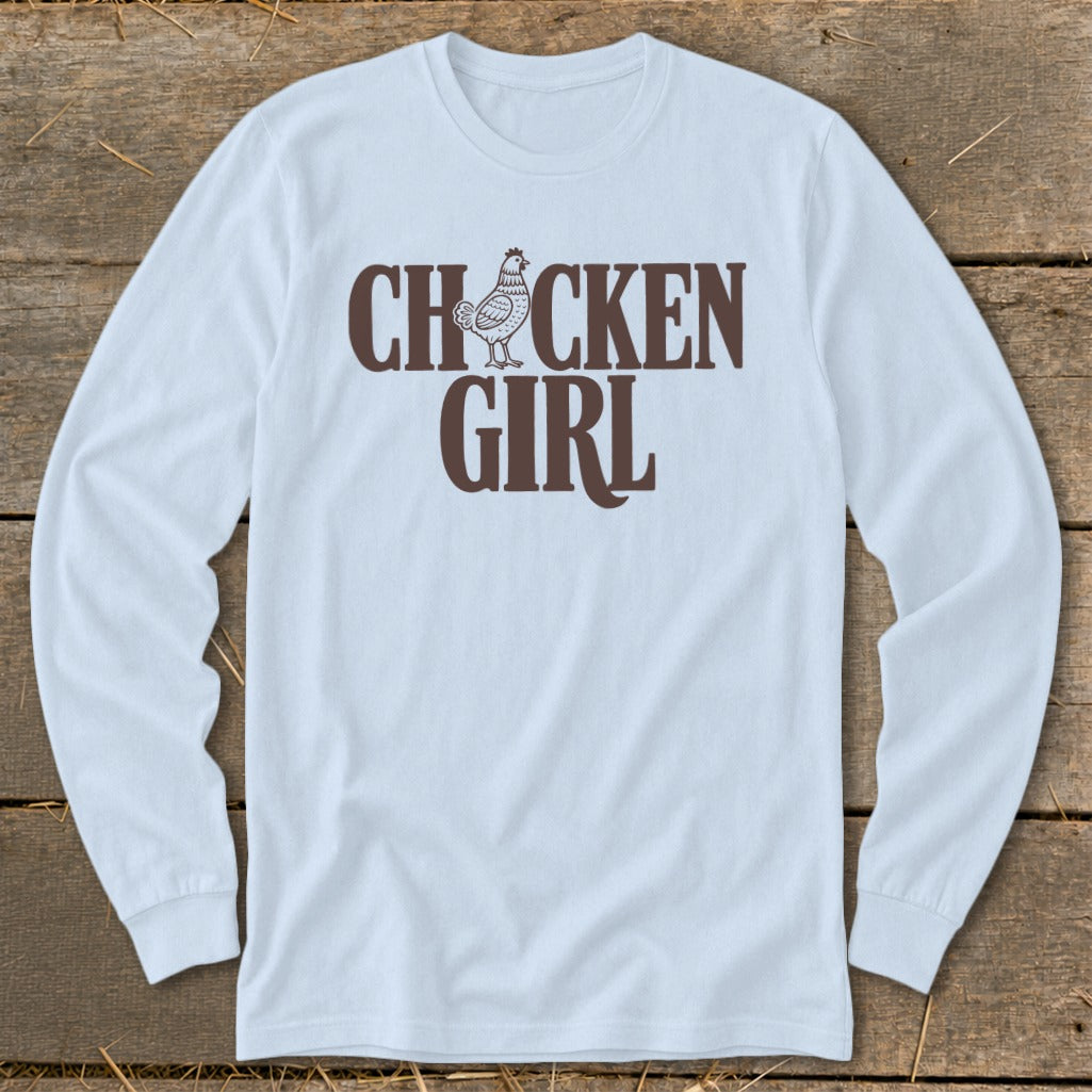 Light blue long-sleeve shirt with "CHICKEN GIRL" text and a chicken graphic.