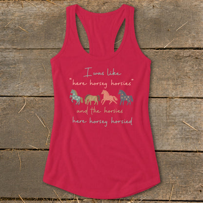 Pink racerback tank top with four illustrated horses and text.