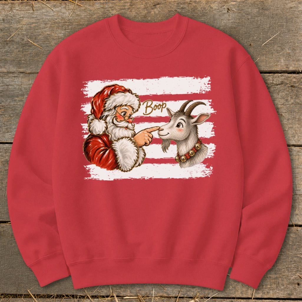 Santa Claus booping a goat on the nose with "Boop" text above.