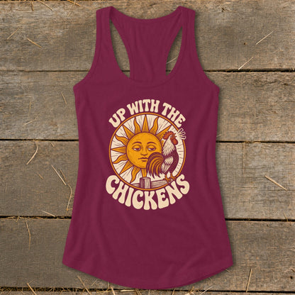 Maroon racerback tank top featuring a retro graphic with a rooster, sun, and text reading Up With The Chickens.