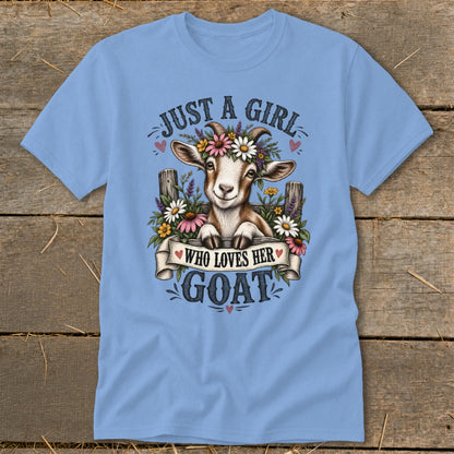 Light blue t-shirt with a goat wearing flowers and text "Just a girl who loves her goat".