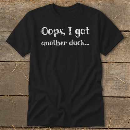 Black t-shirt with white text reading "Oops, I got another duck..."