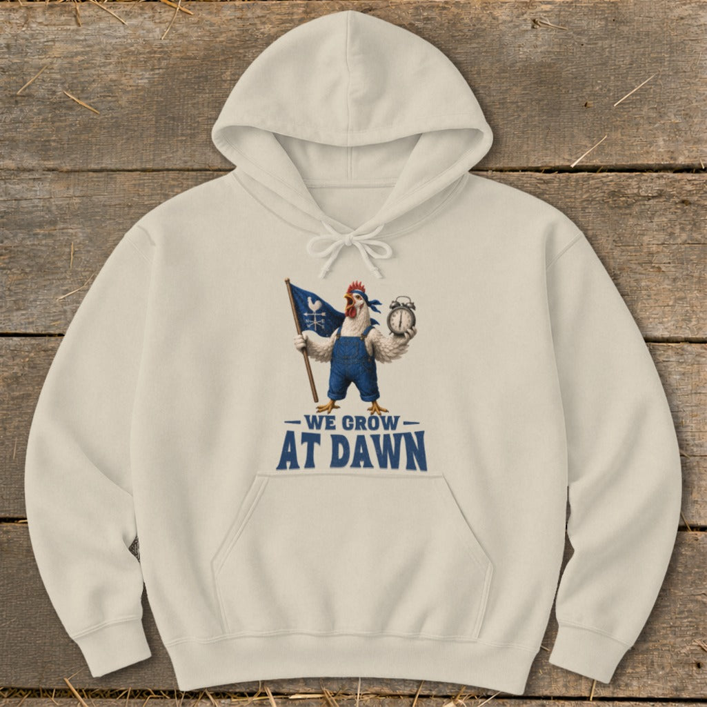 Cream hoodie with a rooster holding a flag and alarm clock, text reads "WE GROW AT DAWN".