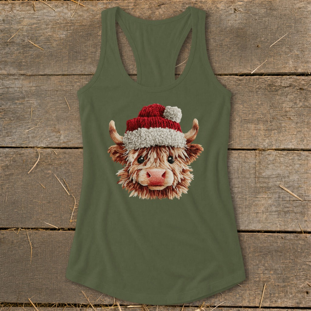 Green tank top featuring a Highland cow wearing a Santa hat.