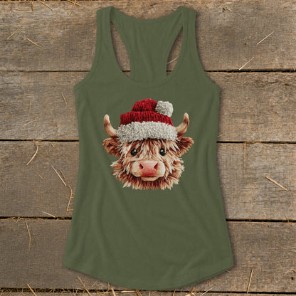 Green tank top featuring a Highland cow wearing a Santa hat.